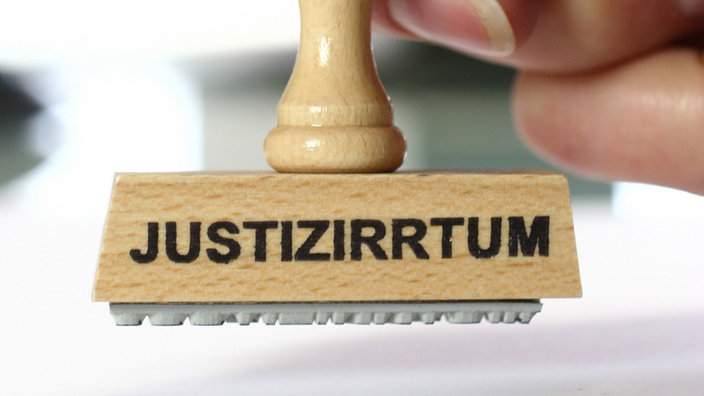 Stempel mit der Aufschrift 'Justizirrtum'